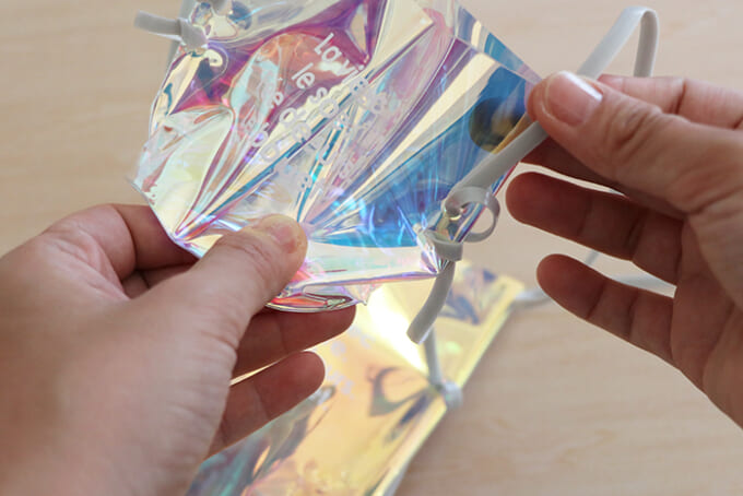 15上の袋_上の_1度結び2裏から紐を