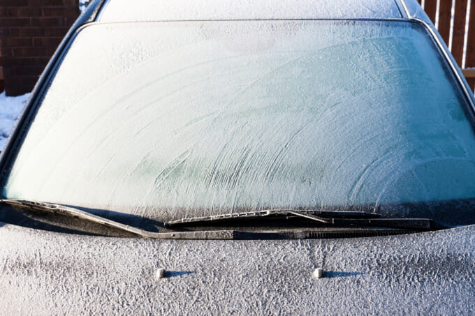 Frost on a completely covered car windscreen