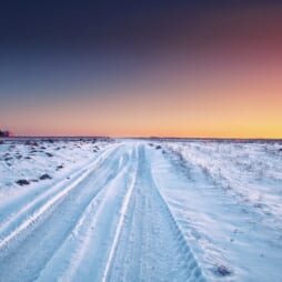 traces of the car wheels on a snowy road